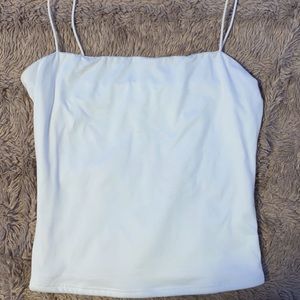 a white tank top isn’t too cropped